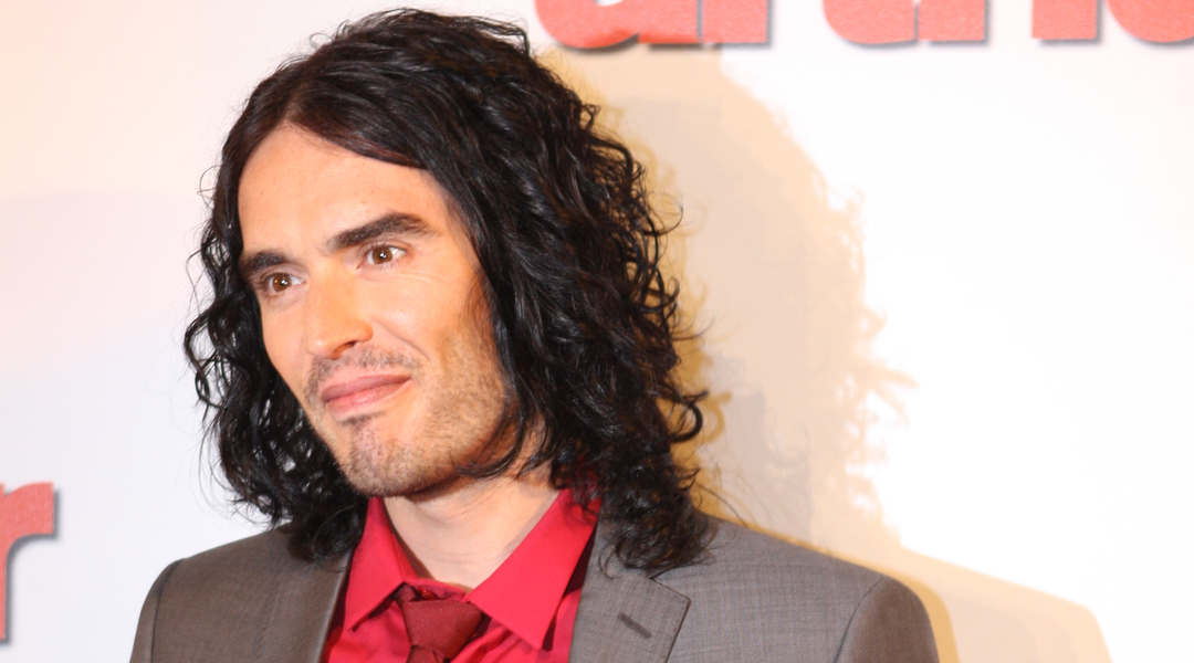 Russell Brand has been on a mission to expose big government corruption, only to face a major media blitz over alleged sexual assaults